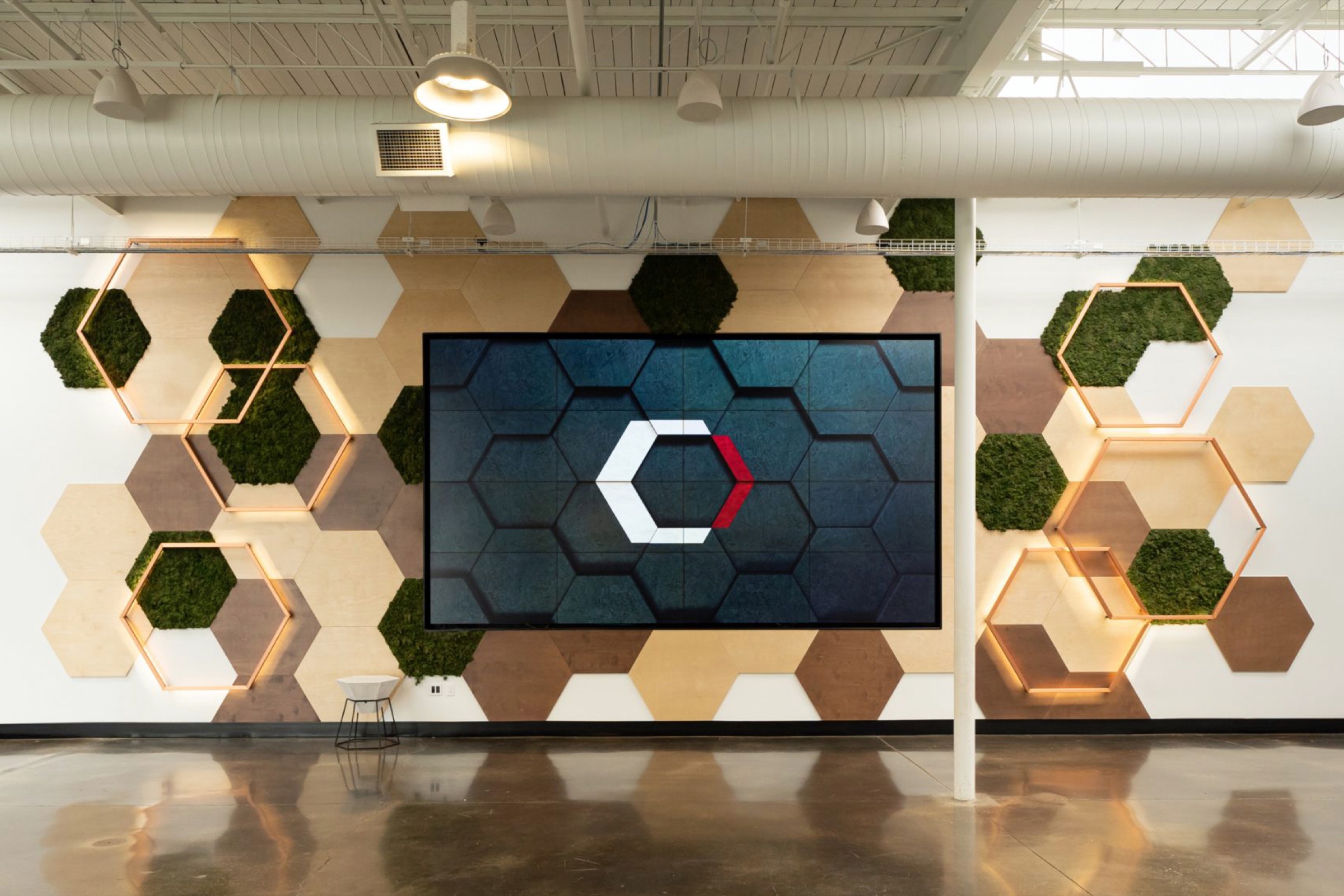 Catalyst137 interior, open-plan workspace beneath original structural roof